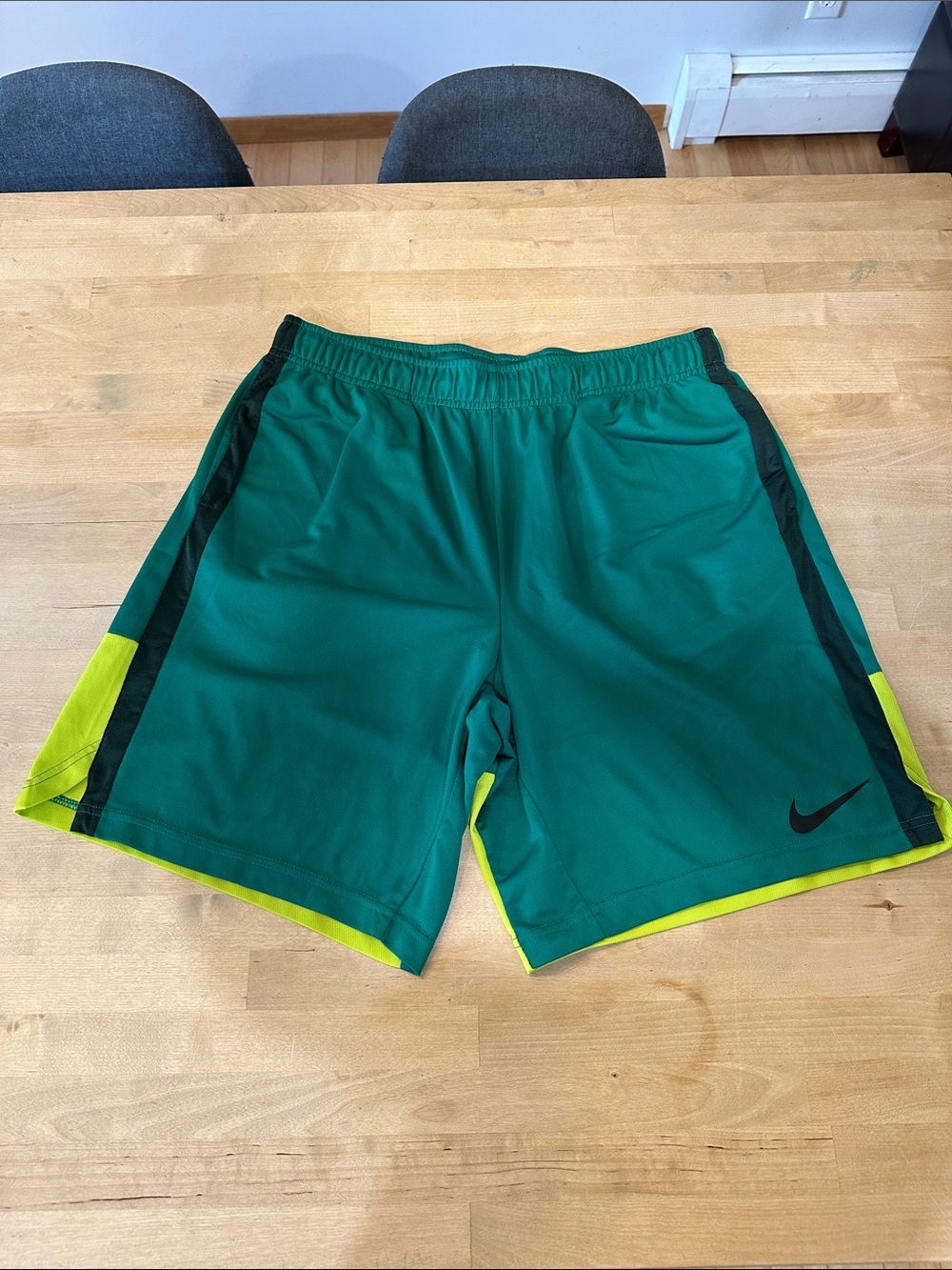 Nike Green Athletic Shorts with Yellow Accent